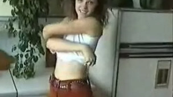 Young Russian pale skin girlfriend strips and masturbates in kitchen