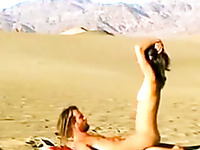 Small tittied gal riding hard cock in a cowgirl pose in a desert