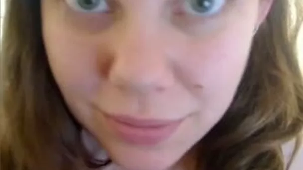 My heavy tittied girlfriend is playing with her fat pussy