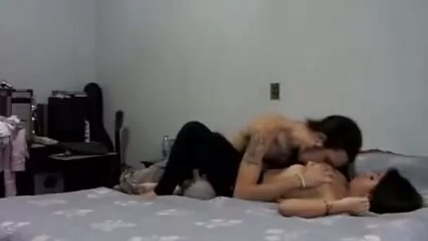 Long haired dude undresses and eats petite brunette girl