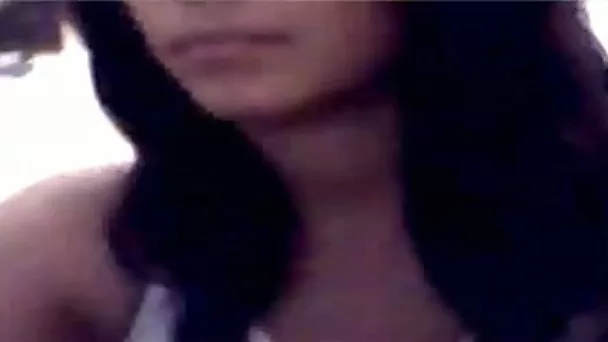 Seductive Latin beauty rubs her shaved cunt in front of me online