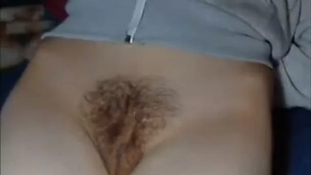 I demonstrate my tight hairy pussy and rub it with my fingers