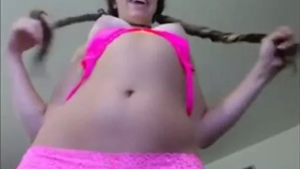 Sexy pigtailed teen takes her clothes off and licks her panties
