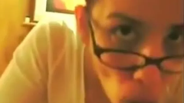 Sexy brunette chick in glasses pleases me with some nice blowjob