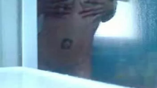 Girlfriend is so horny in the shower with glass walls