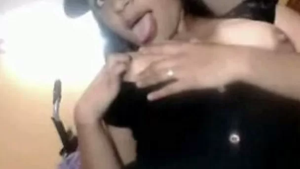 Slutty Latina girl tried to suck her own puffy nipples on web cam