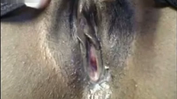 Fingering my black soaking pussy in closeup amateur video
