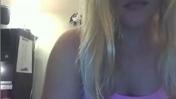 Horny blonde slut playing with her saggy titties