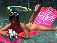 Stunning golddigging brunette bimbo naked in the pool