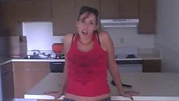 Chubby and adorable amateur girl spreads her legs on the floor