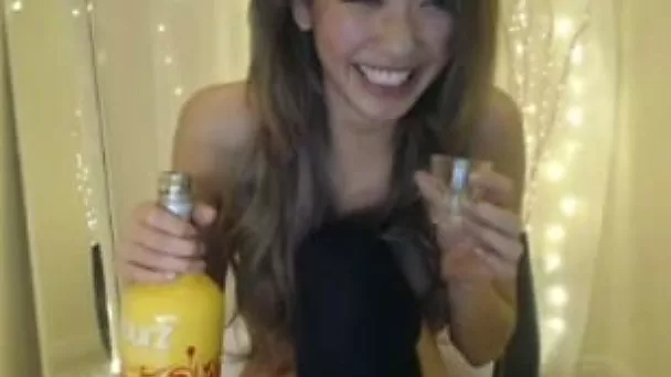 Cute Asian sweet slender girl in black stockings is petting cunt with toy