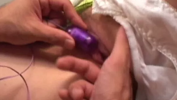Busty and beautiful Japanese slut stuffed with toy and teased