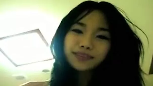 Sweet Asian babe opens her hairy pussy for my hard dick