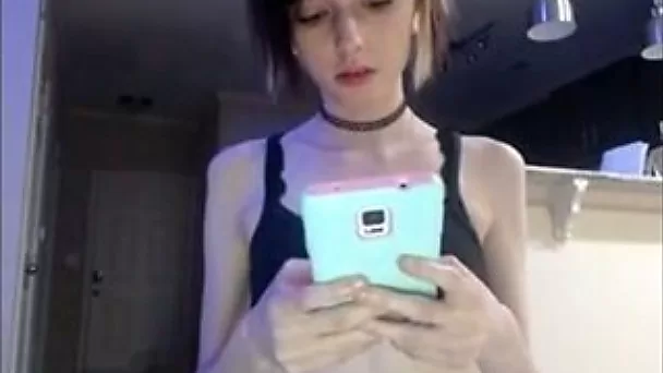Petite bodied chick dancing seductively with a buttplug