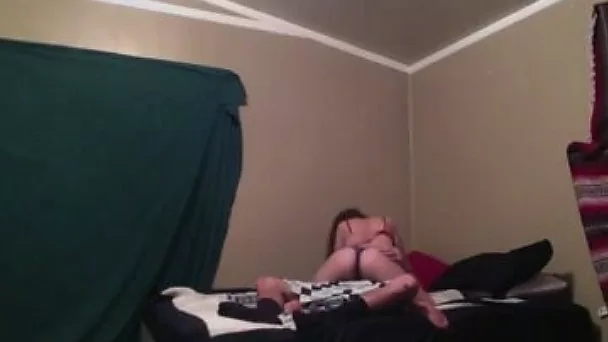 Long haired bitch rides hard dick in a cowgirl position
