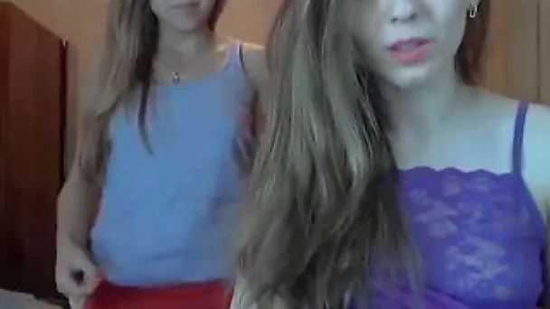 Two cute Russian teens posing seductively on webcam