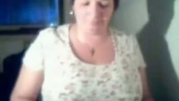 Boobalicious granny playing with her goodies in amateur video