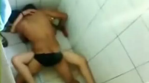 Cocky coed fucks his sexy Indian bitch in the bathroom cabin
