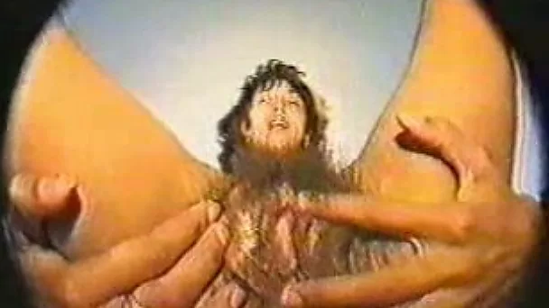 Extremely hairy Indian girl sucks a dildo and shoves it in her cunt