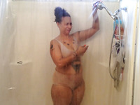Thickalicious black woman dancing seductively while taking shower