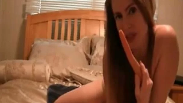 Feeling lonely dark haired webcam nympho started with toy on wide bed