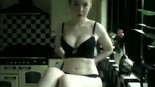 Charming red haired webcam beauty with sexy booty masturbated in kitchen