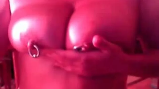 Kinky amateur nympho exposed her puffy pierced nipples and big tits