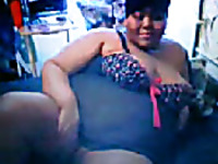 Big black momma with huge belly in corset shows me her plump booty