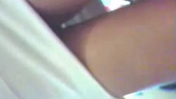 Hot and sexy latina in white dress filmed upskirt in public