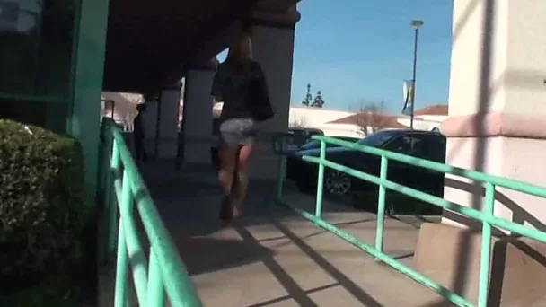 Sassy and curvy blonde white lady followed and filmed on cam
