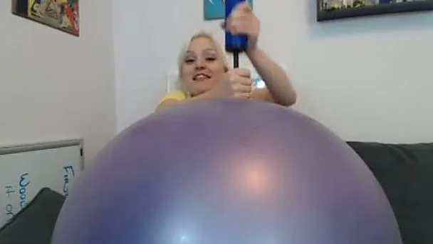 Hilarious blonde nympho with big boobies was playing with inflatable toy