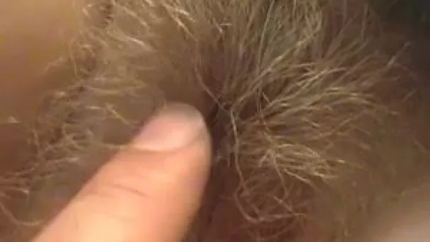 Kinky closeup video of my own wife's hungry hairy pussy which I love tickling