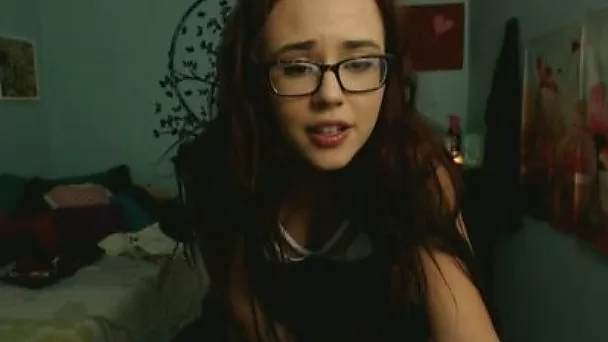 Sweet charming brunette in glasses flashed her big perky tits and bum