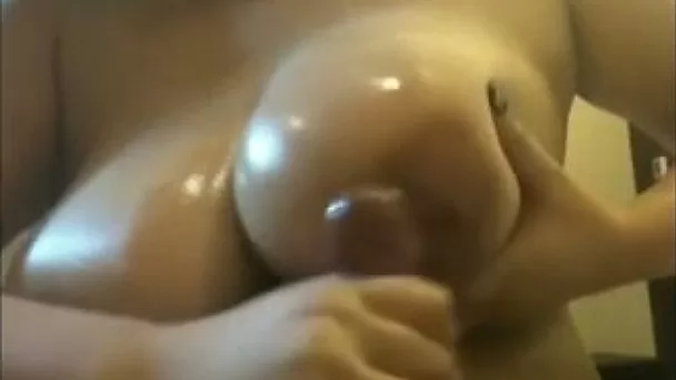 Juicy jugged lover rubbing my pecker between her titties