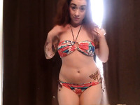 Redhead amateur girl  posing on cam in sexy bikini