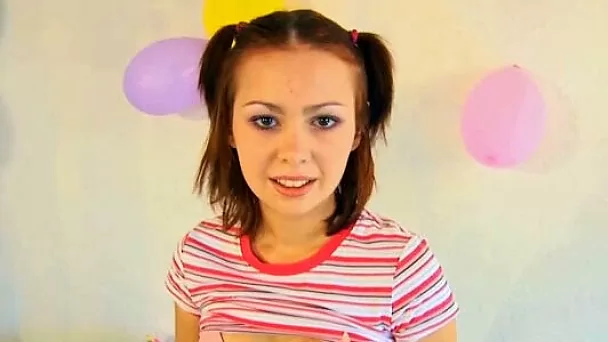 Amazing young cutie flashes her lovely breasts in pink bra