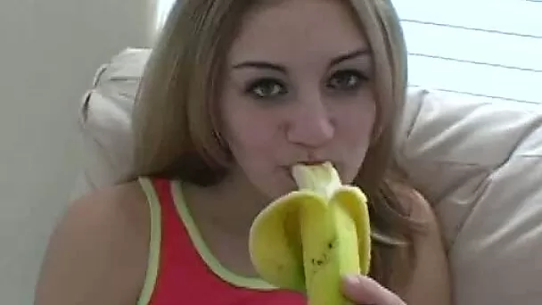 Blonde amateur white girl is seductive even when she eats banana