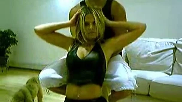 Playful blonde girl and her friend teasing people on webcam