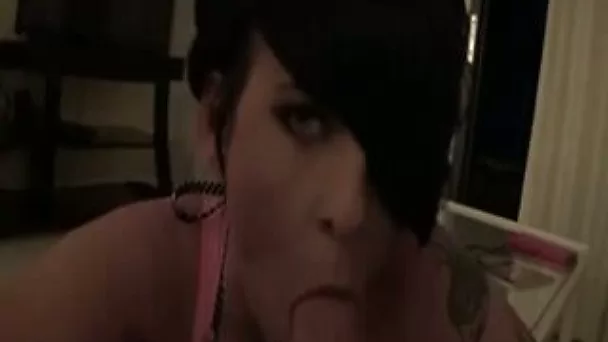 Dark haired tattooed lady was totally busy with giving a nice head