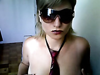 Webcam whore in sunglasses showed off her natural tight tits