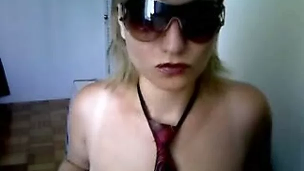 Webcam whore in sunglasses showed off her natural tight tits