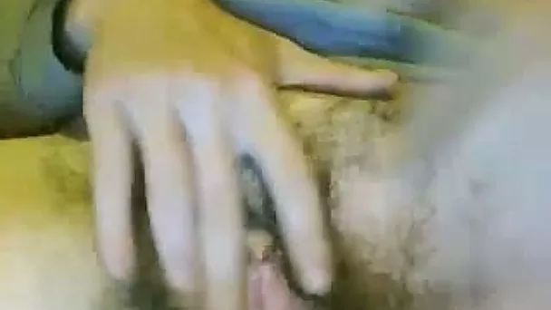 Ugly woman fingering extra hairy vagina in amateur video