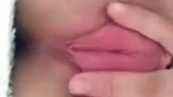 Zealous and cute anon chick was rubbing her nice pink pussy lips a bit