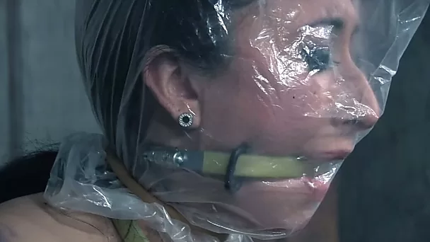 Brunette white skank suffocated with a plastic bag