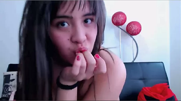 Lubricious brunette girl riding big dildo in front of camera