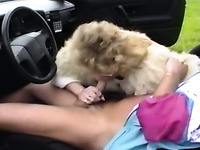 Blonde retro slut in the car giving blowjob to her man