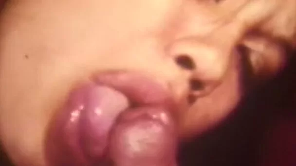 Sweet retro Japanese chick giving head to a white guy