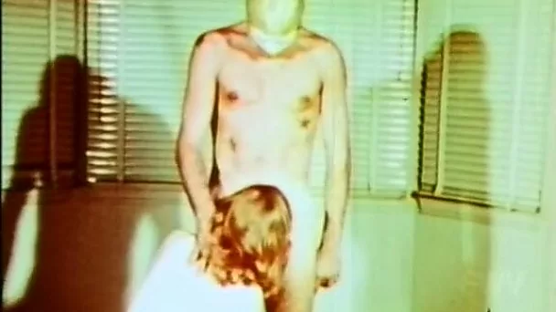 Wicked guy in the mask feeds horny lady with his dick