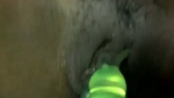 Dark skinned webcam nympho used green toy to tease her wet pussy