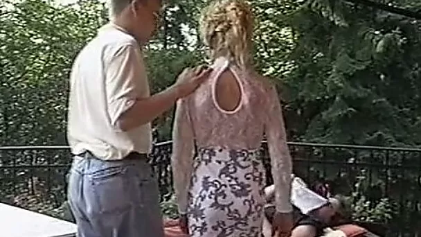 Adorable curly haired blondie sucking dick on the lounger